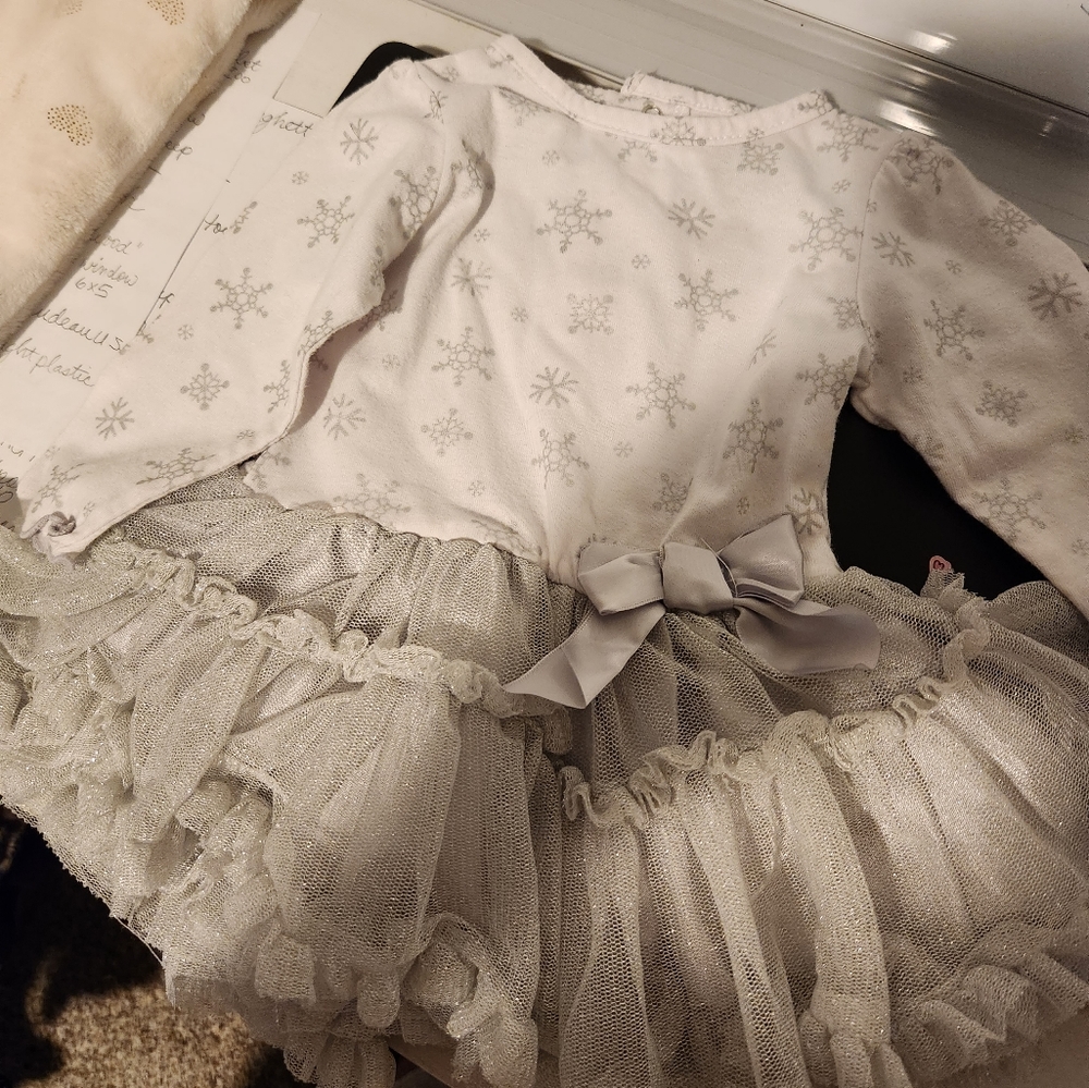 Baby Glam silver ruffled, long sleeve dress. Size 6 months.